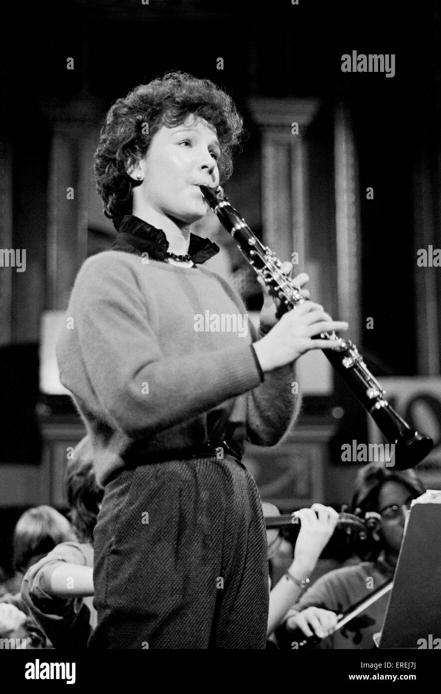 Emma Johnson, British clarinetist, pictured in rehearsal at the Schools Prom, Royal Albert Hall, London, 1984. (b. 1966) Stock Photo