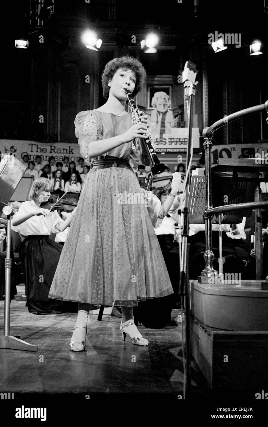 Emma Johnson, British clarinetist, pictured in concert at the Schools Prom, Royal Albert Hall, London, 1984. (b. 1966) Stock Photo
