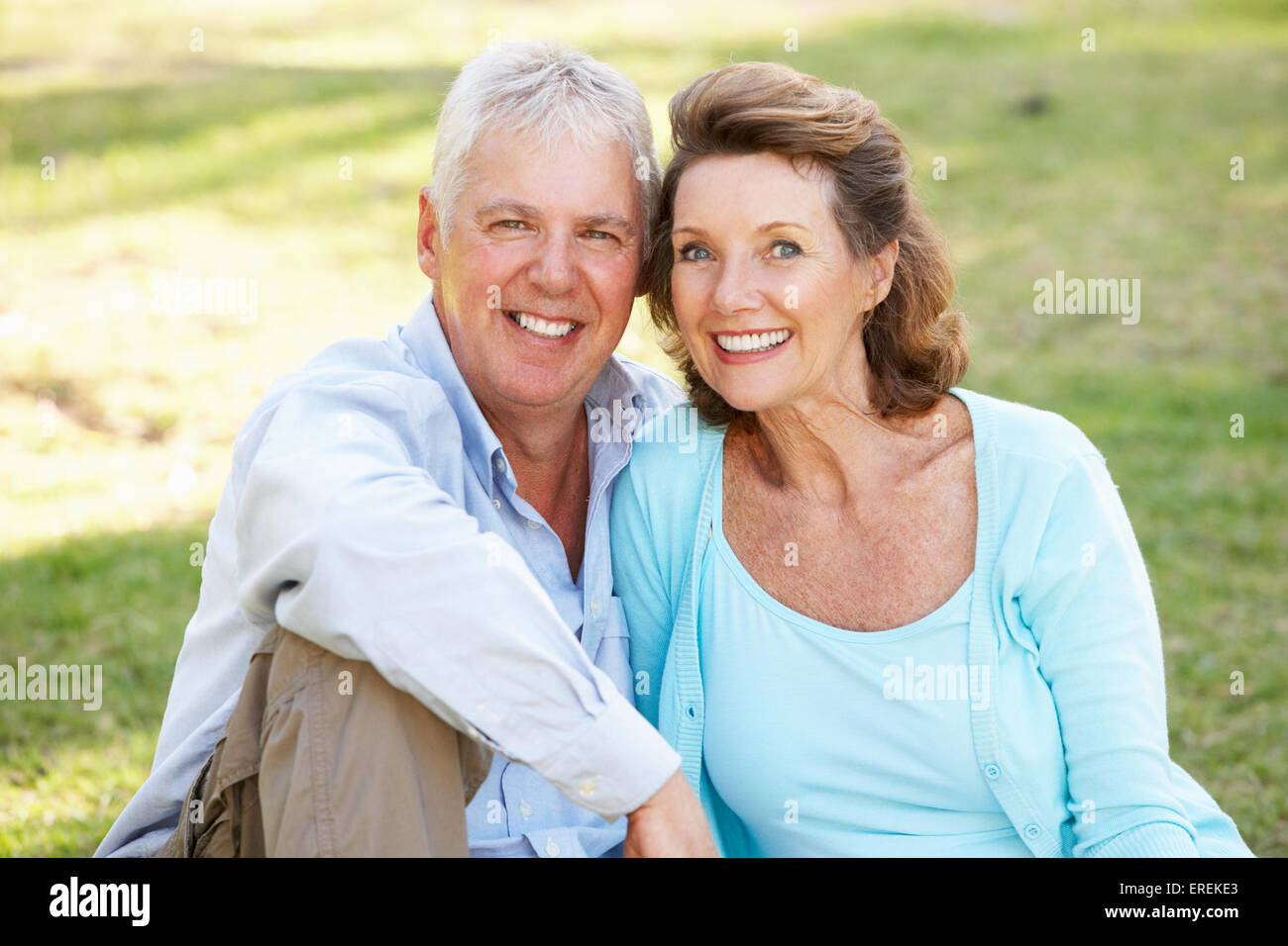 Portrait Of Senior Couple Relaxing In Park Stock Photo - Alamy
