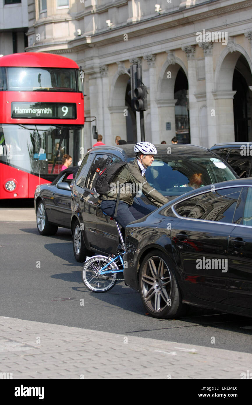Traffic traveling along The Strand towards Trafalgar Square, London, England Stock Photo