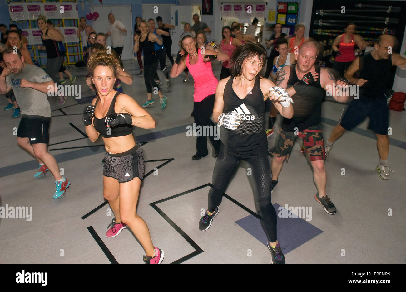 People taking part in a Insanity Combat-Athon for a cancer charity, Alton, Hampshire, UK. Stock Photo