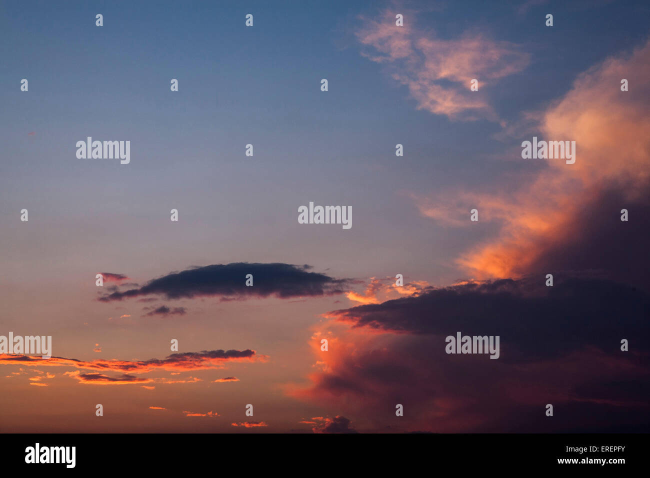 Dramatic clouds at sunset Stock Photo - Alamy