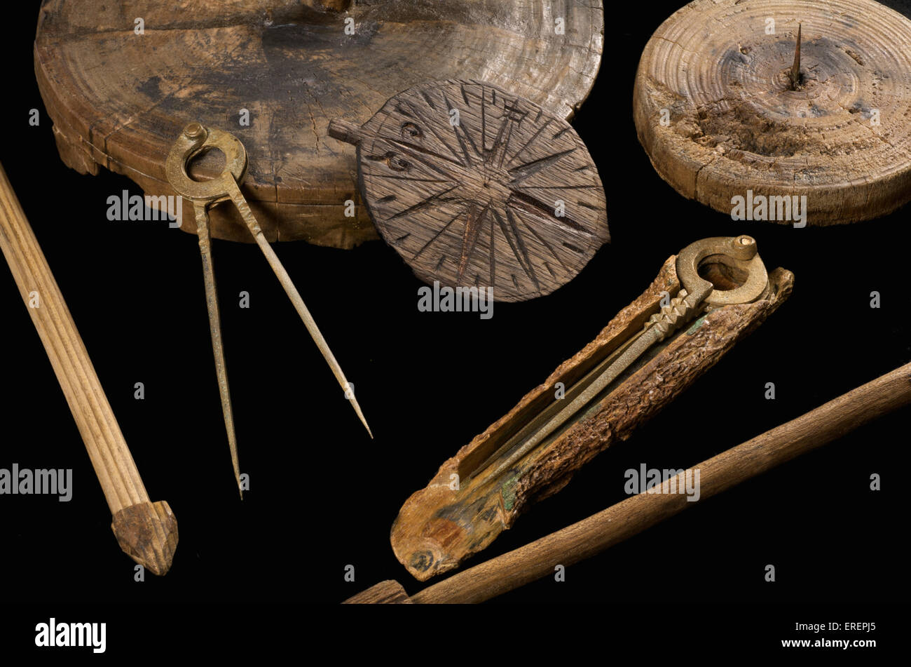 Bronze dividers and the remains of compass roses and measuring sticks, used for navigation on the Mary Rose Stock Photo