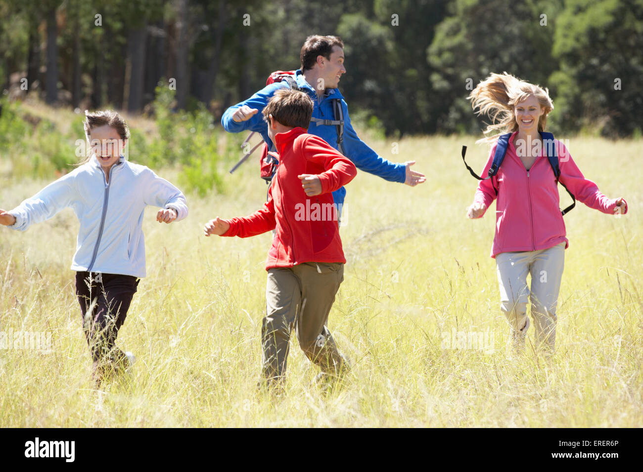 Family On Hike In Beautiful Countryside Stock Photo