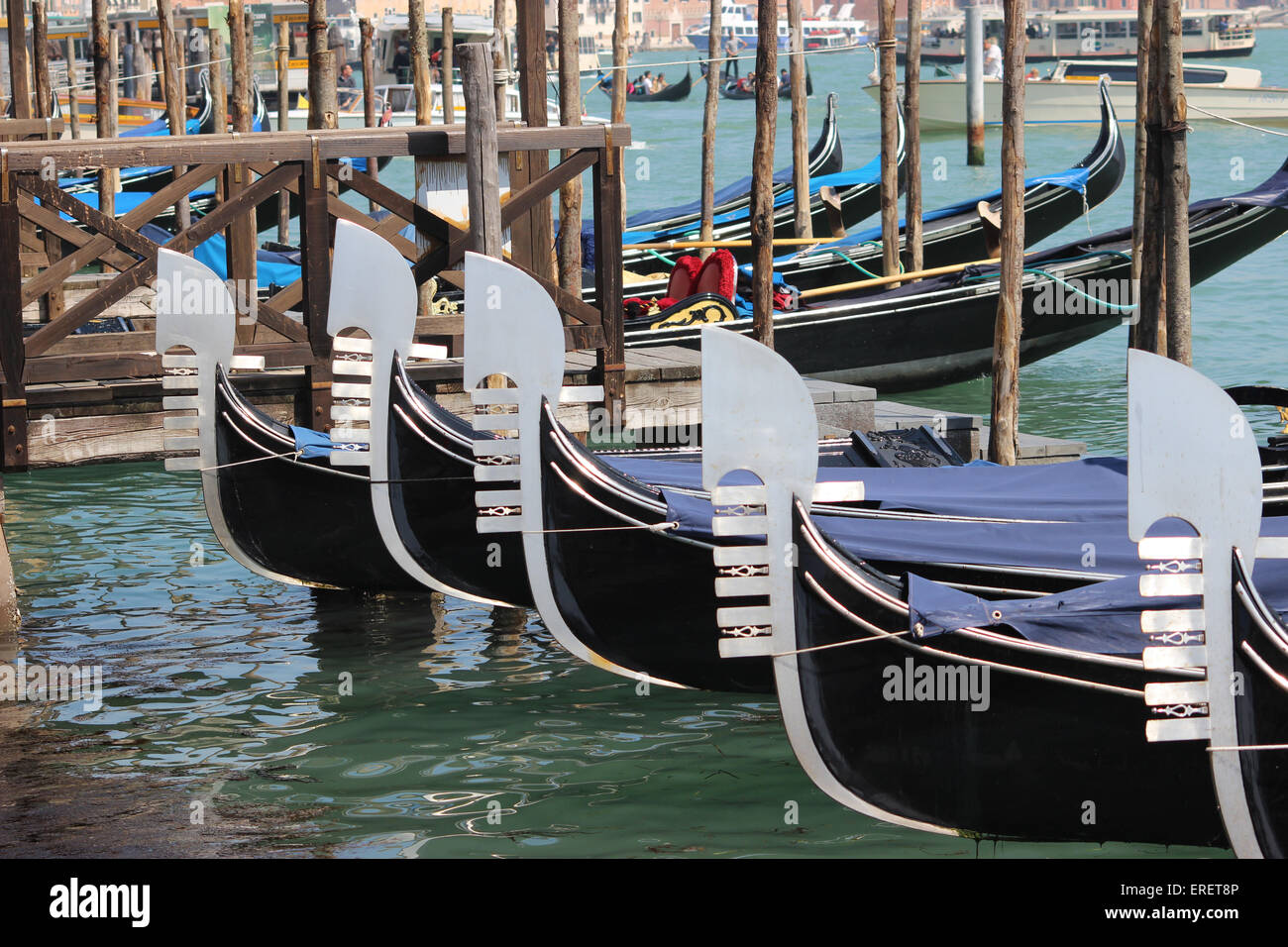 Gondolas Gondolas lined up  on the Grand Canal in Venice, Italy Stock Photo