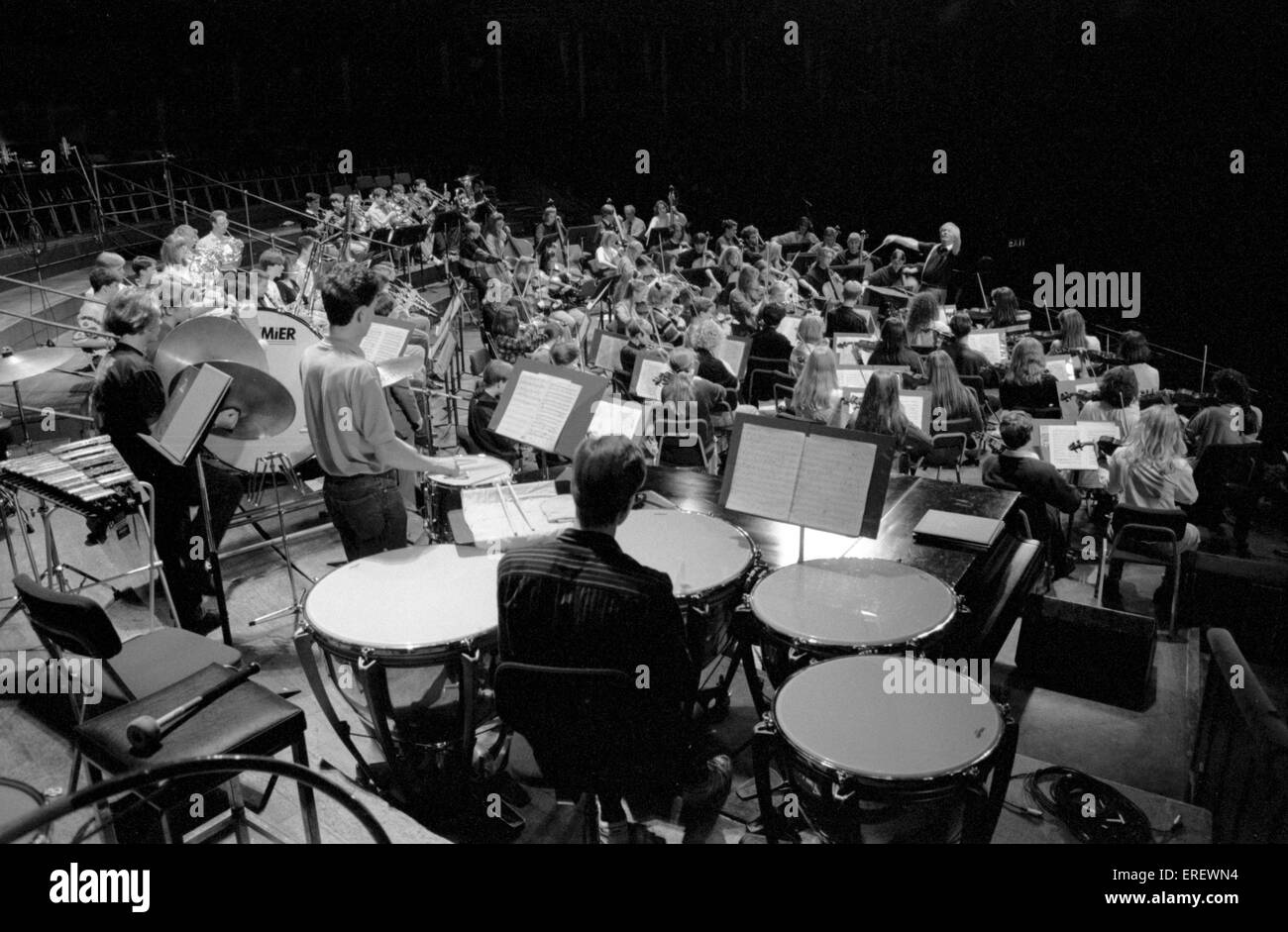 Youth symphony orchestra with percussion section in the foreground  at one of the Schools Prom concerts at the Royal Albert Stock Photo