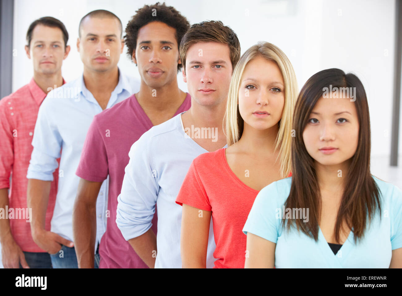 Line Of Young Business People In Casual Dress Stock Photo