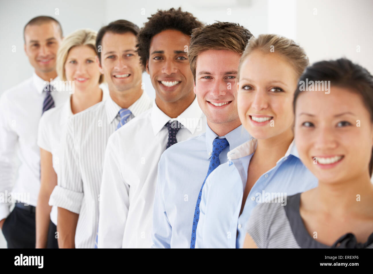 Line Of Happy And Positive Business People Stock Photo