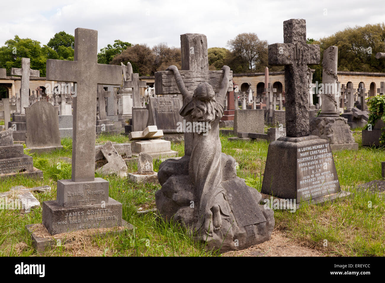 Graves, Crosses, Monuments and Memorials in  the Central section of Brompton Cemetery, near the Colonnades. Stock Photo