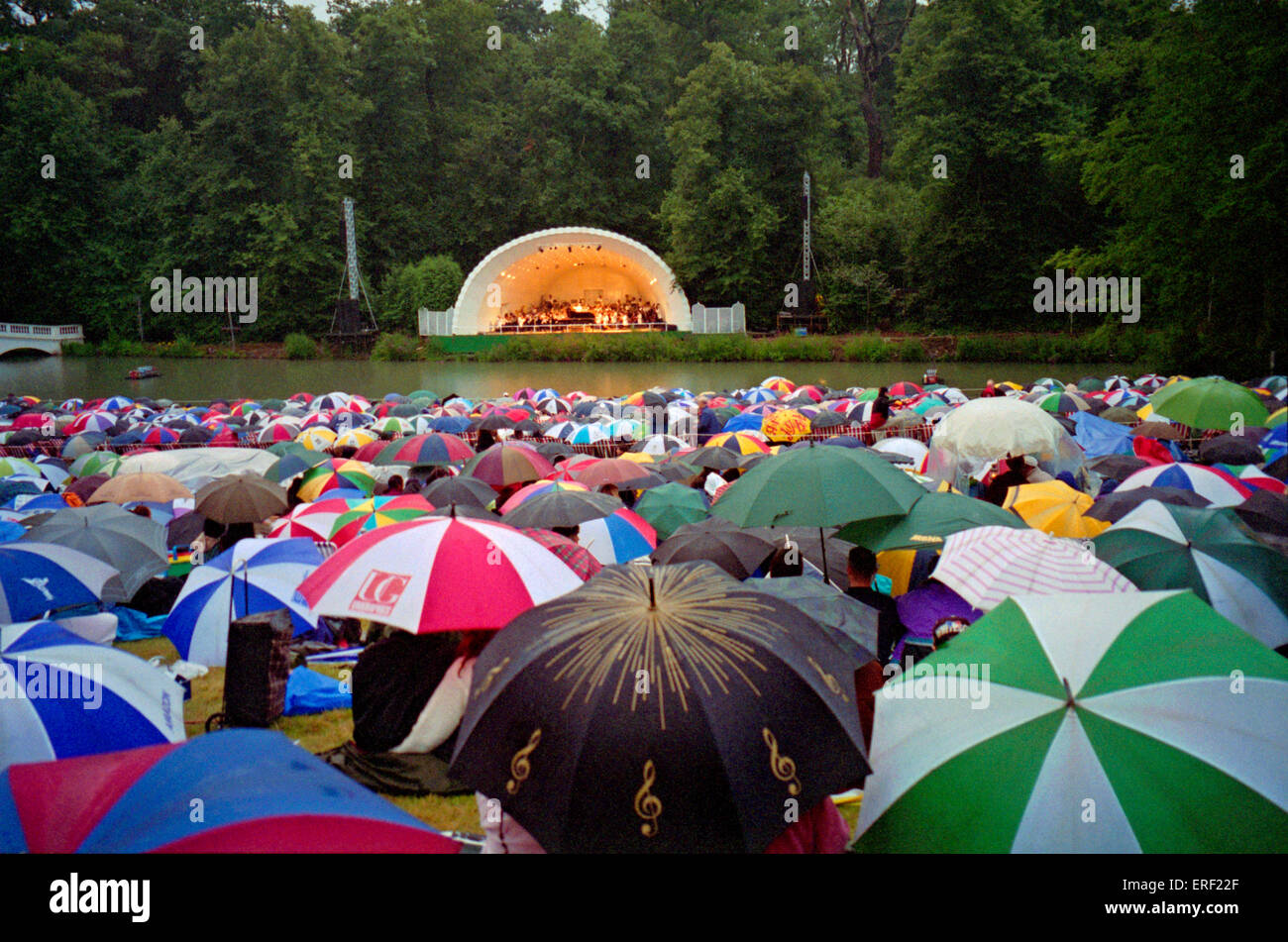 A sea of umbrellas at a wet Kenwood Lakeside Concert, London. Stock Photo