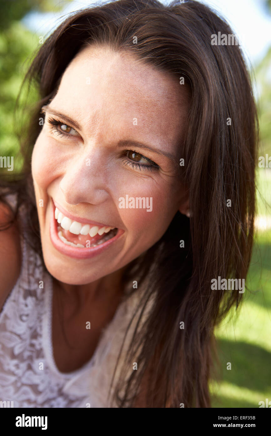 Head And Shoulders Portrait Of Smiling Woman Stock Photo - Alamy