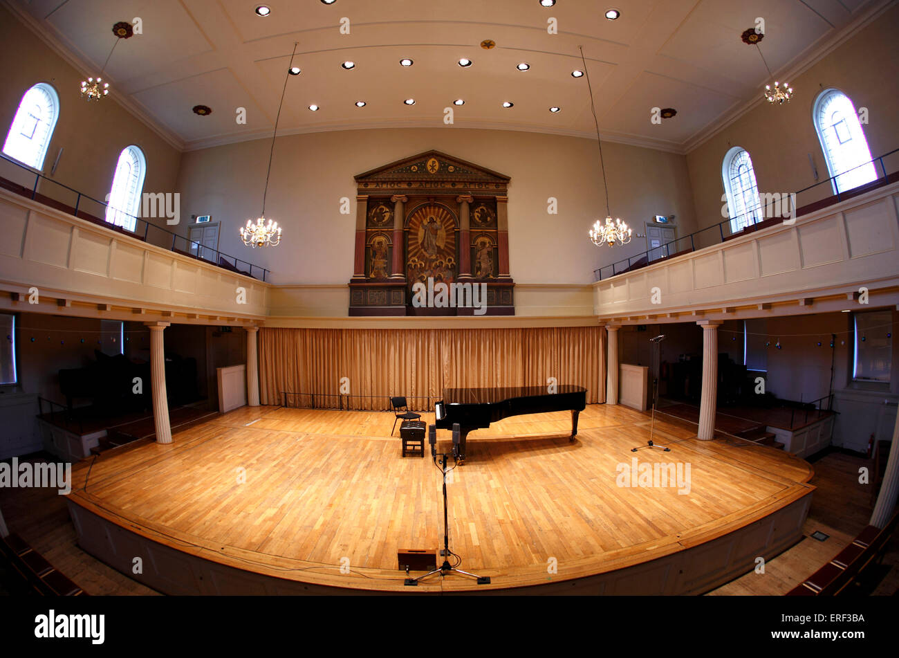 St Georges, Brandon Hill, Bristol. Small concert hall with piano on the stage Stock Photo