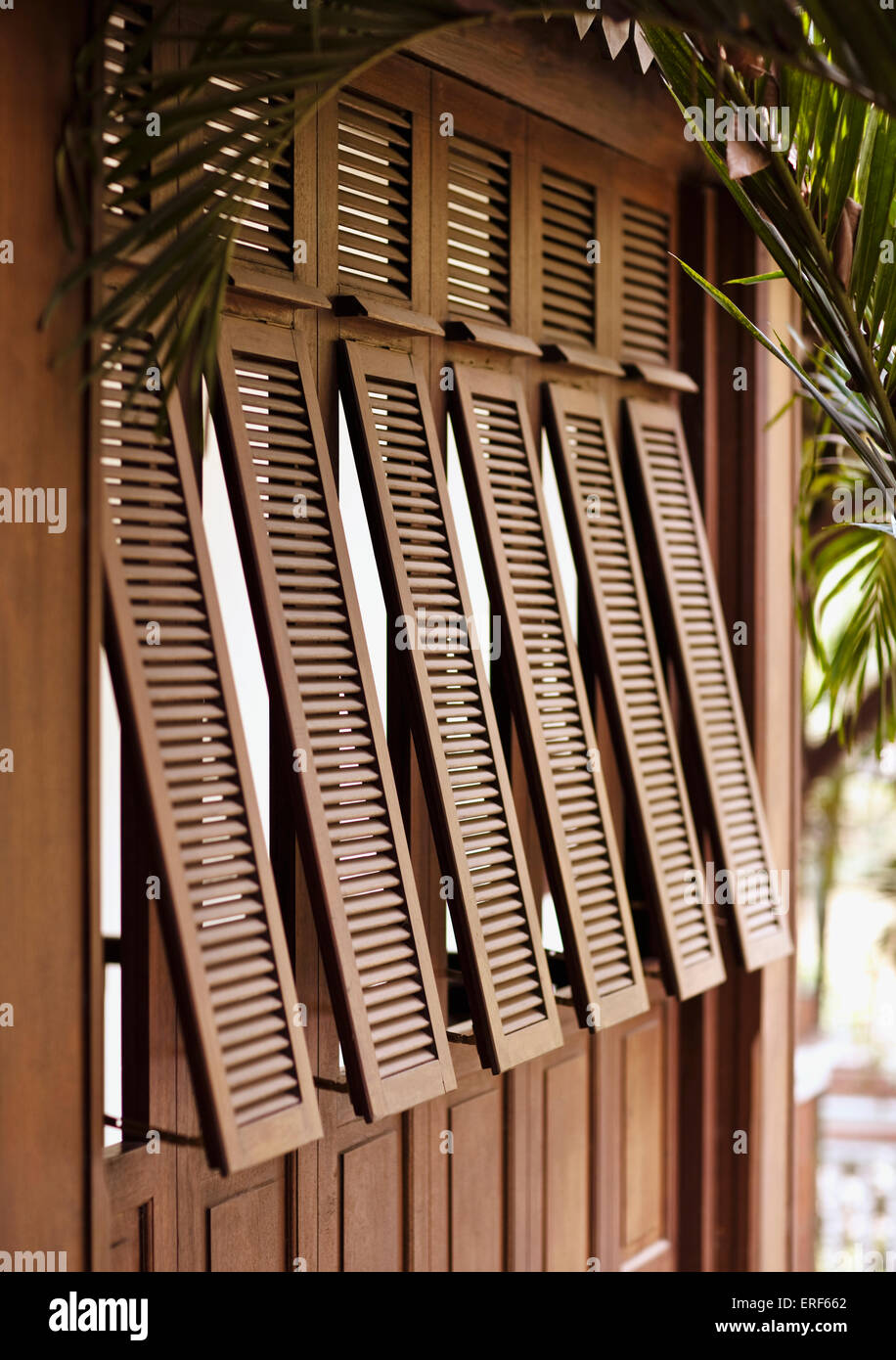 An exterior shot of French-style shutters at La Residence d'Angkor, Siem Reap, Cambodia. Stock Photo
