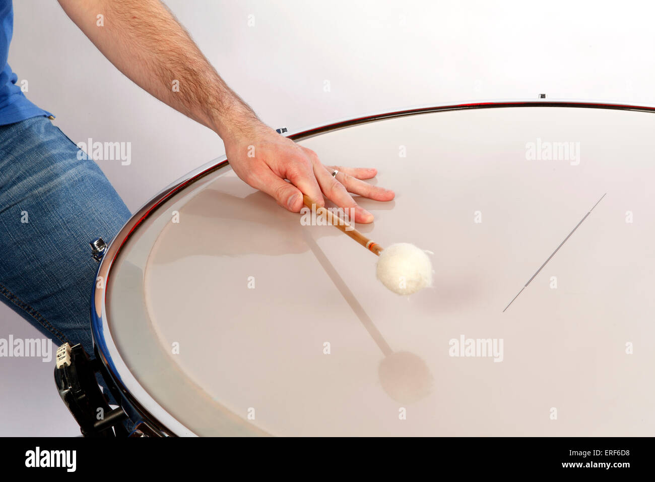 Timpani, damping the head, playing position. Technique Stock Photo Alamy