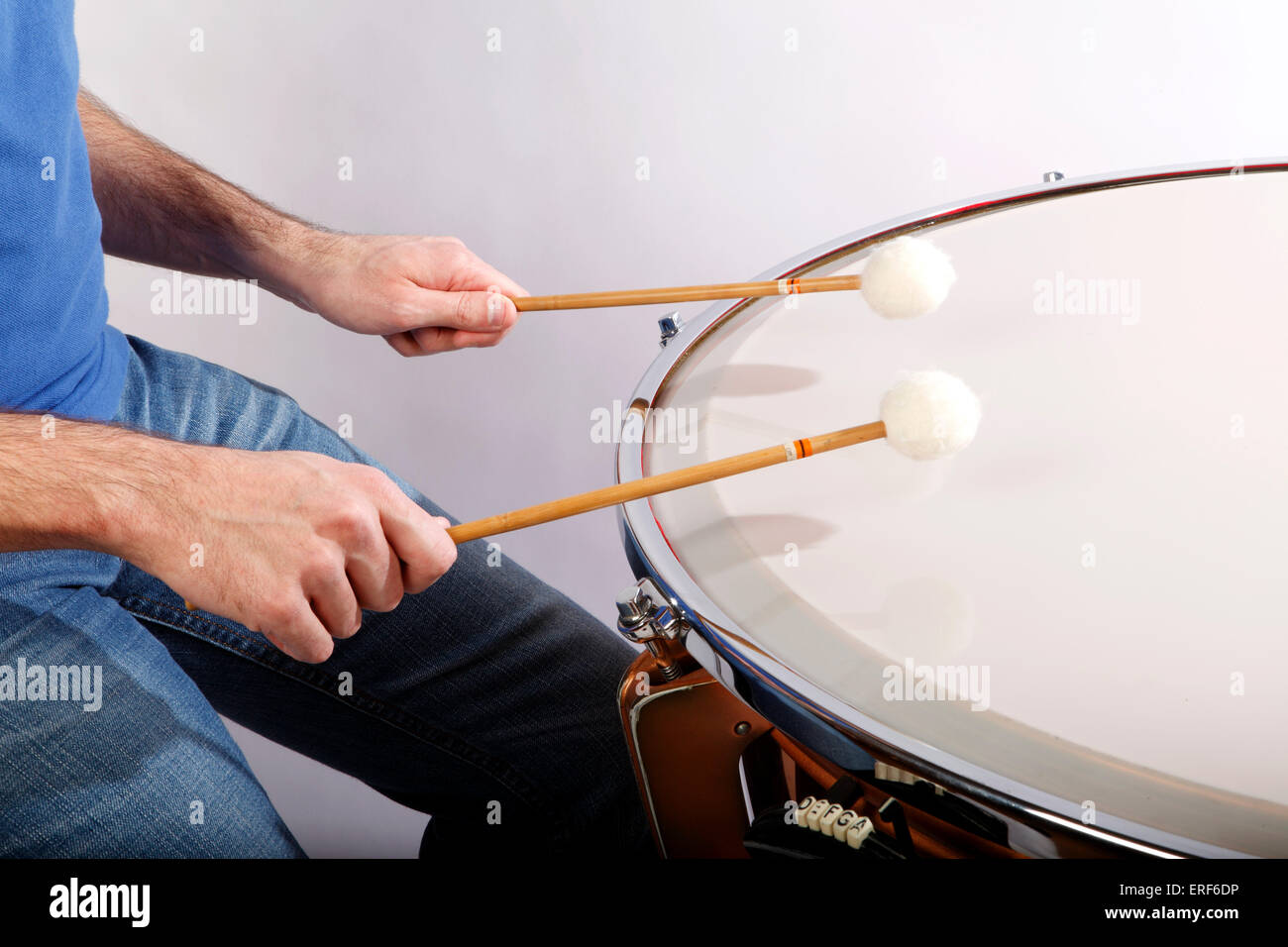 Technical image of the 'thumbs to the side' grip used for Timpani