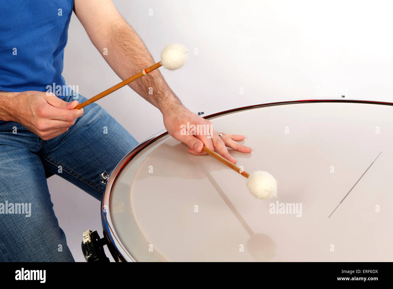 Timpani, damping the head, playing position. Technique Stock Photo Alamy