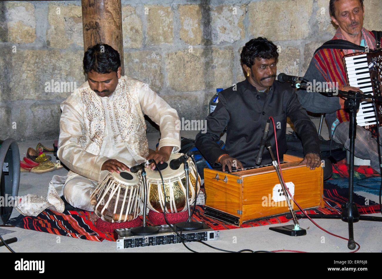Rajasthani tabla and harmonium players. The musicians are Rafik Mohamed