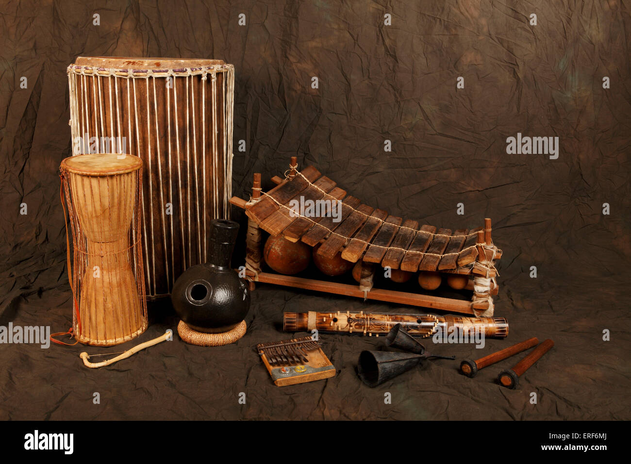 A collection of African musical instrument. Back row left to right