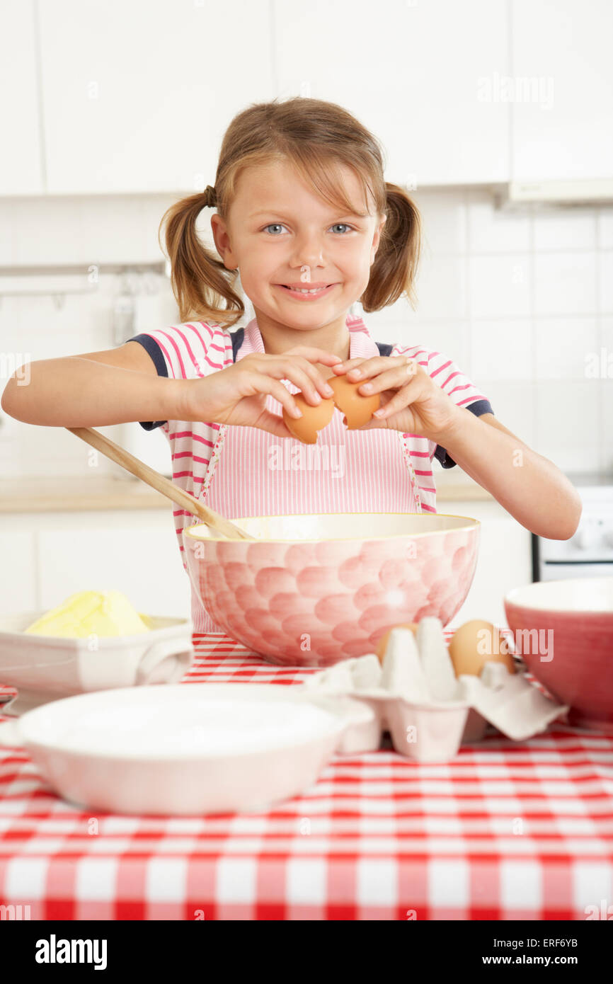 Girl Baking In Kitchen Stock Photo Alamy