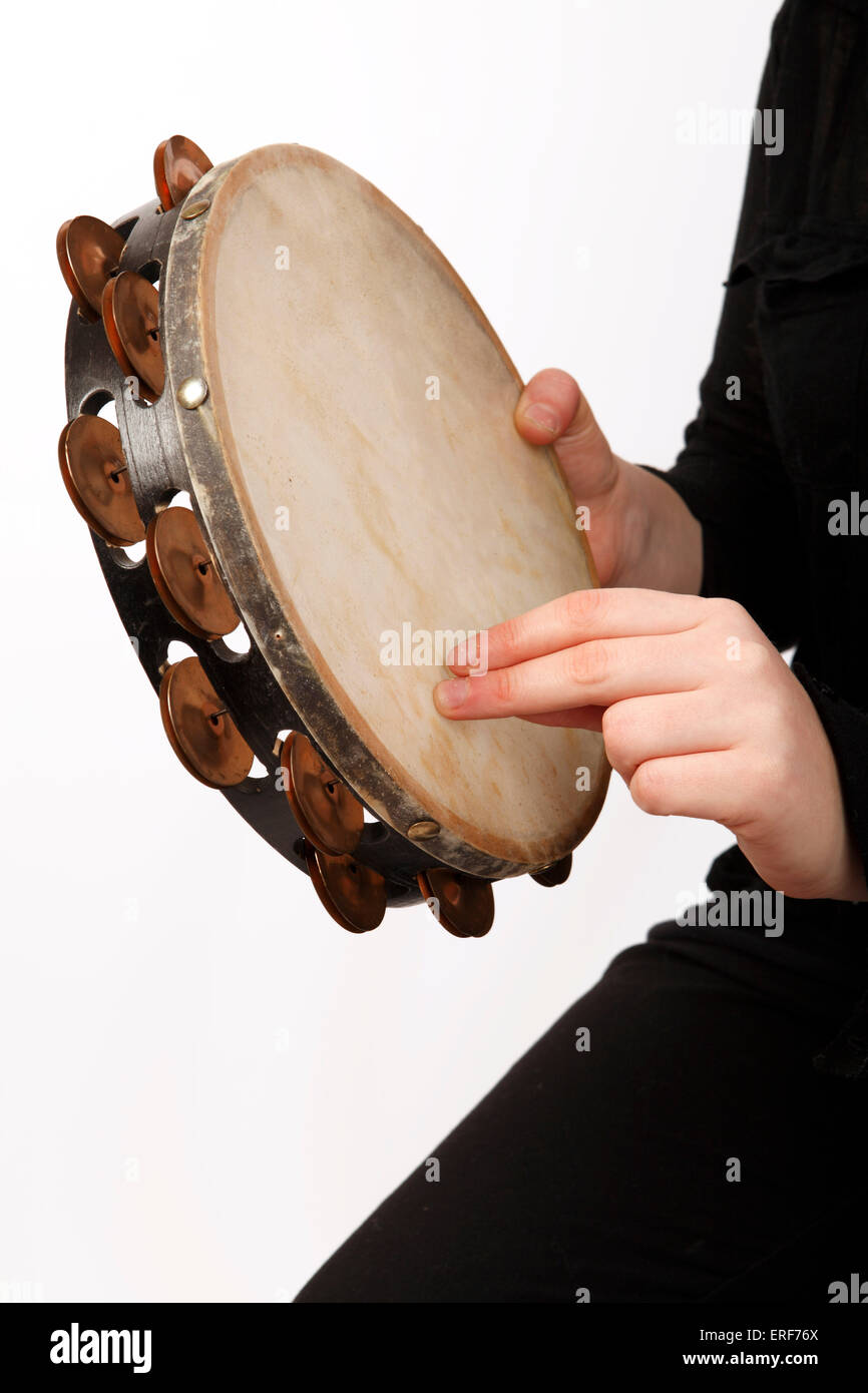 Tambourine technique, a finger roll in playing position Stock Photo - Alamy