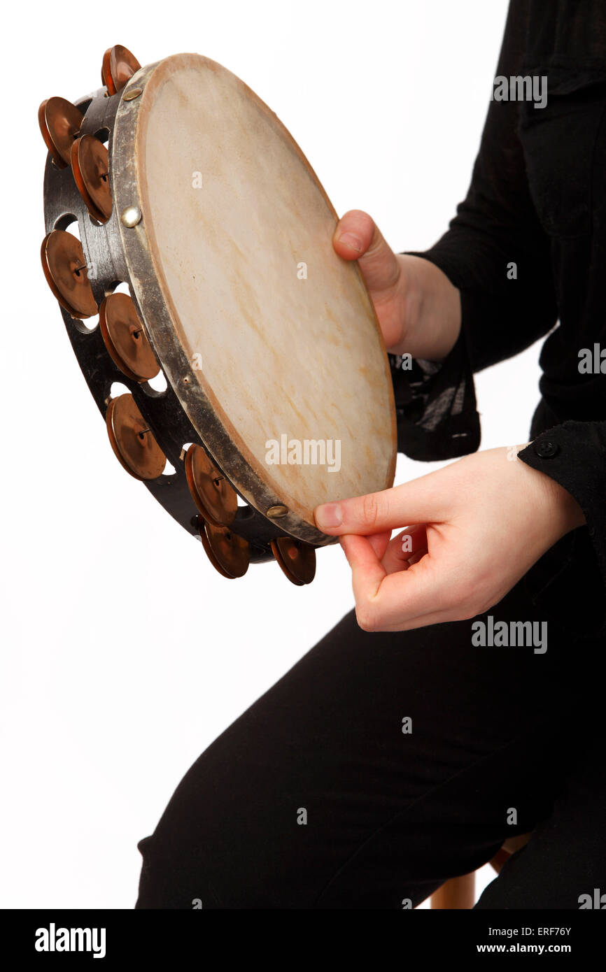 Tambourine technique, a thumb roll in playing position Stock Photo - Alamy