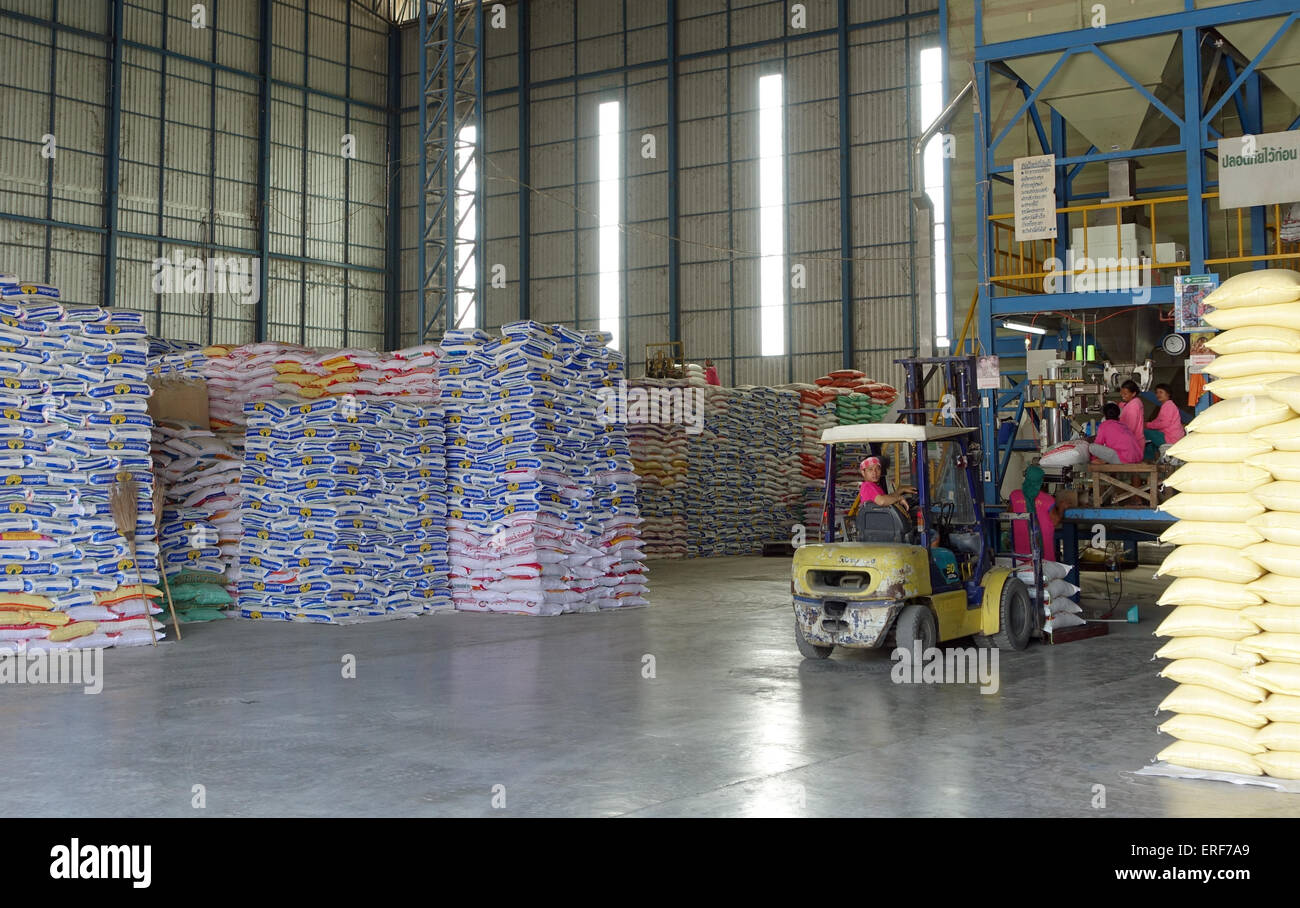 Food Rice Factory Sukhothai, Thailand. 24th Feb, 2015. Stacked sacks of rice at a rice ...