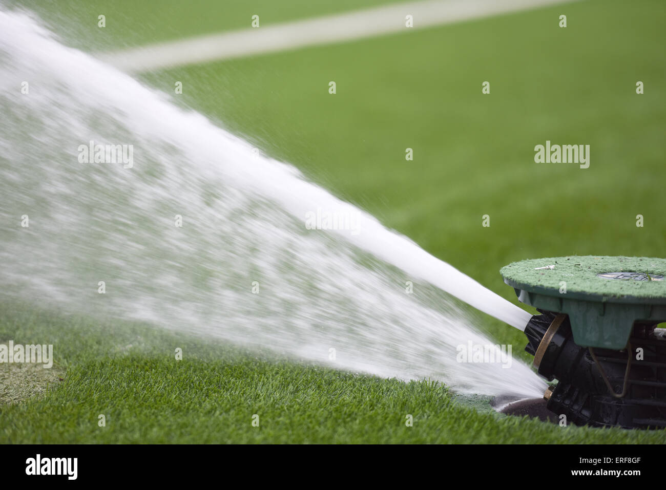 Baden, Switzerland. 27th May, 2015. A lawn sprinkler sprinkles water on the  artificial turf during the Women's international friendly soccer match  between Switzerland and Germany at ESP Stadium in Baden, Switzerland, 27