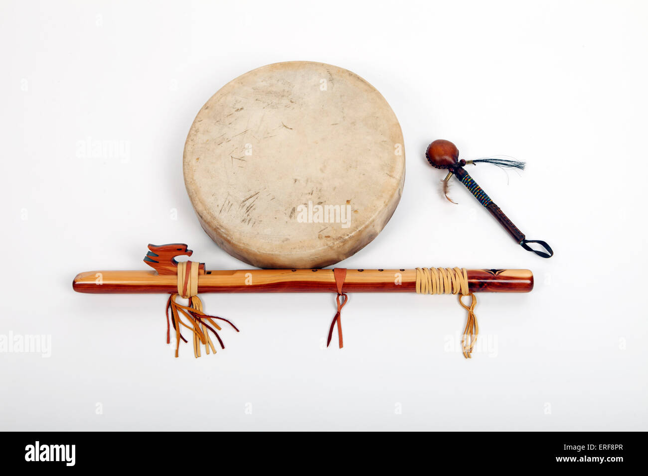 Collection or North American or Red Indian instruments. Red Indian hand  drum made of wood block construction and a hide or Stock Photo - Alamy