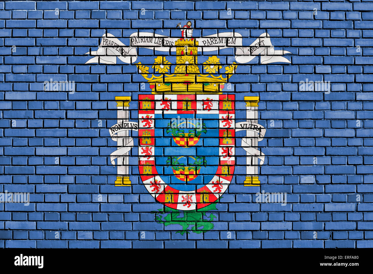 flag of Melilla painted on brick wall Stock Photo