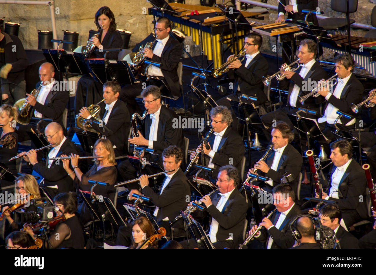Wind section of the Orchestre National de Montpellier, France, performing in the Roman Amphitheatre of Orange on National Music Stock Photo