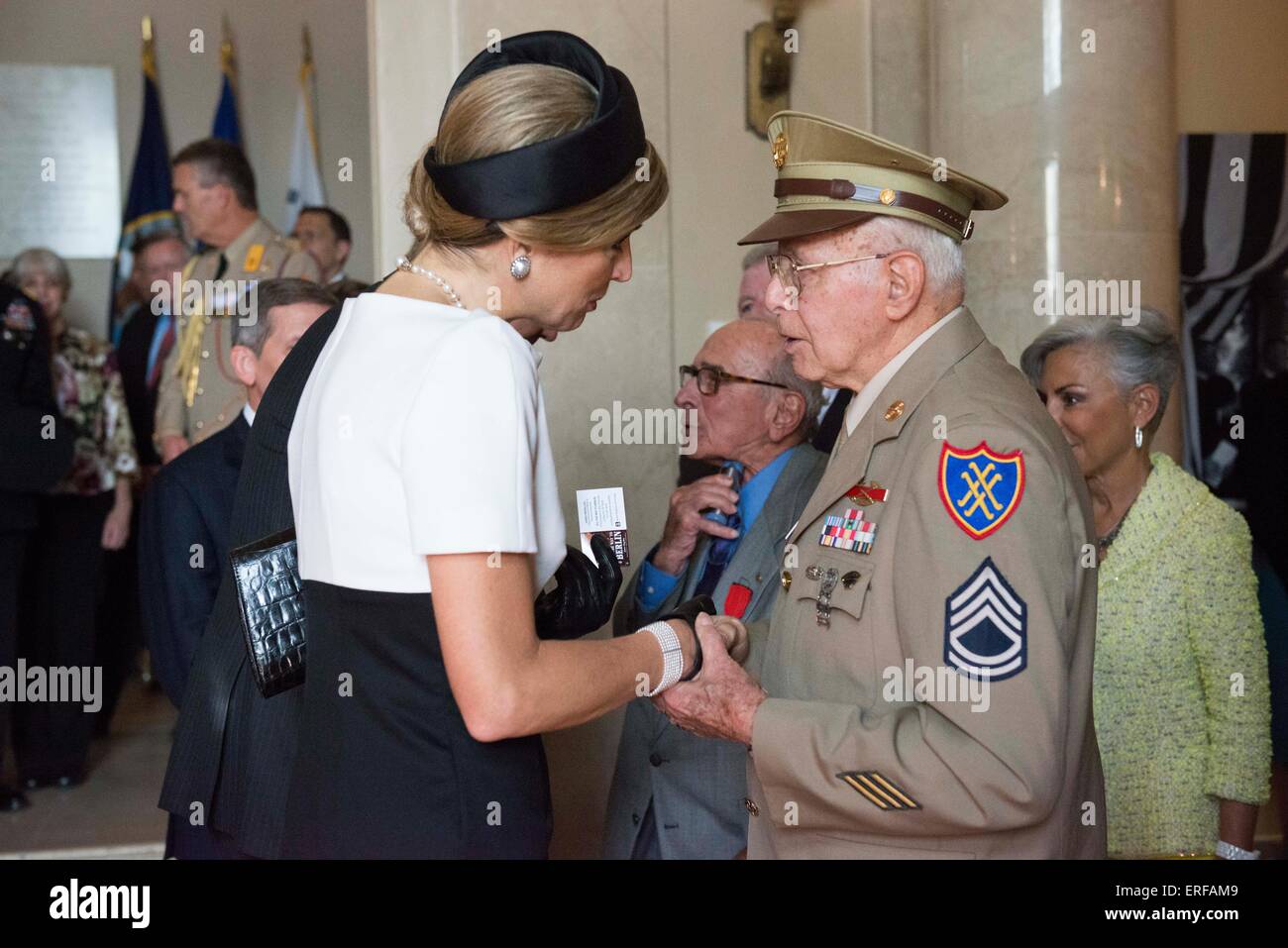 Queen Maxima of the Netherlands meets with World War II and Korean War veteran Don Bertinoduring during a visit to the Memorial Display Room at Arlington National Cemetery June 1, 2015, in Arlington, Virginia. The royal couple later placed a wreath at the Tomb of the Unknown Soldier and then met with veterans from World War II. Stock Photo