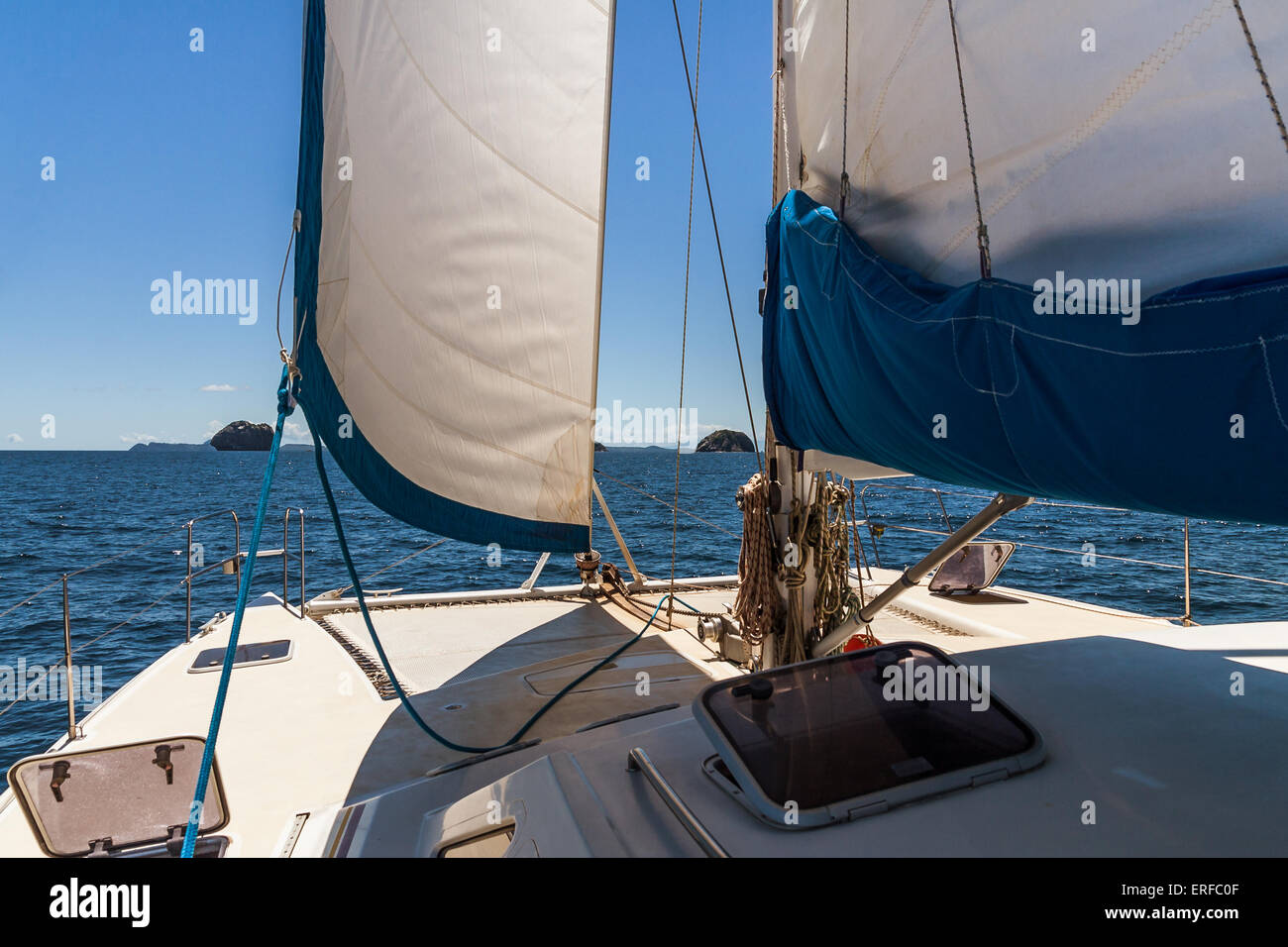 Sailing yacht catamaran cruising in the Mitsio archipelago Stock Photo
