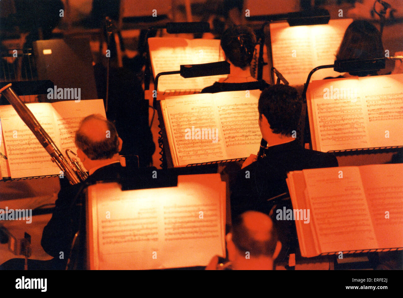 ORCHESTRA WIND SECTION in concert View from behind showing players