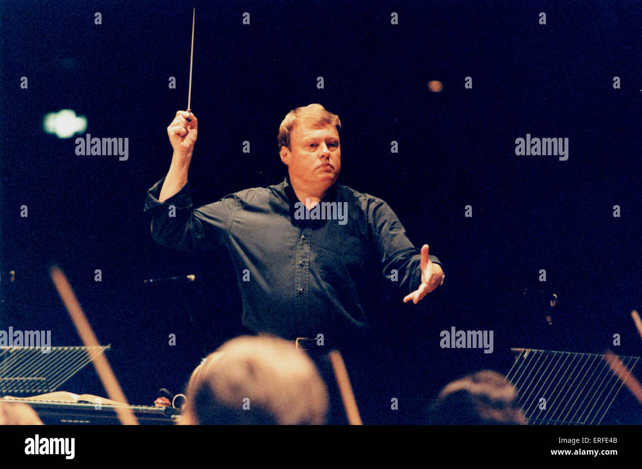 HICKOX, Richard - conducting the BBC National Orchestra of Wales English conductor, 1948- Stock Photo