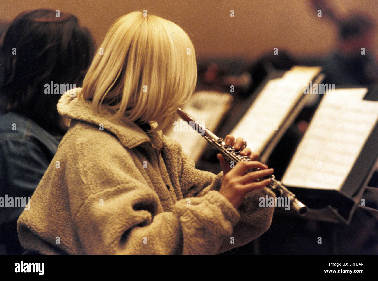 INST flute orchestral being played Over shoulder shot Stock Photo