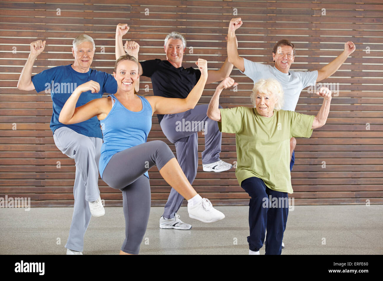Happy senior group doing a bokwa class in gym Stock Photo
