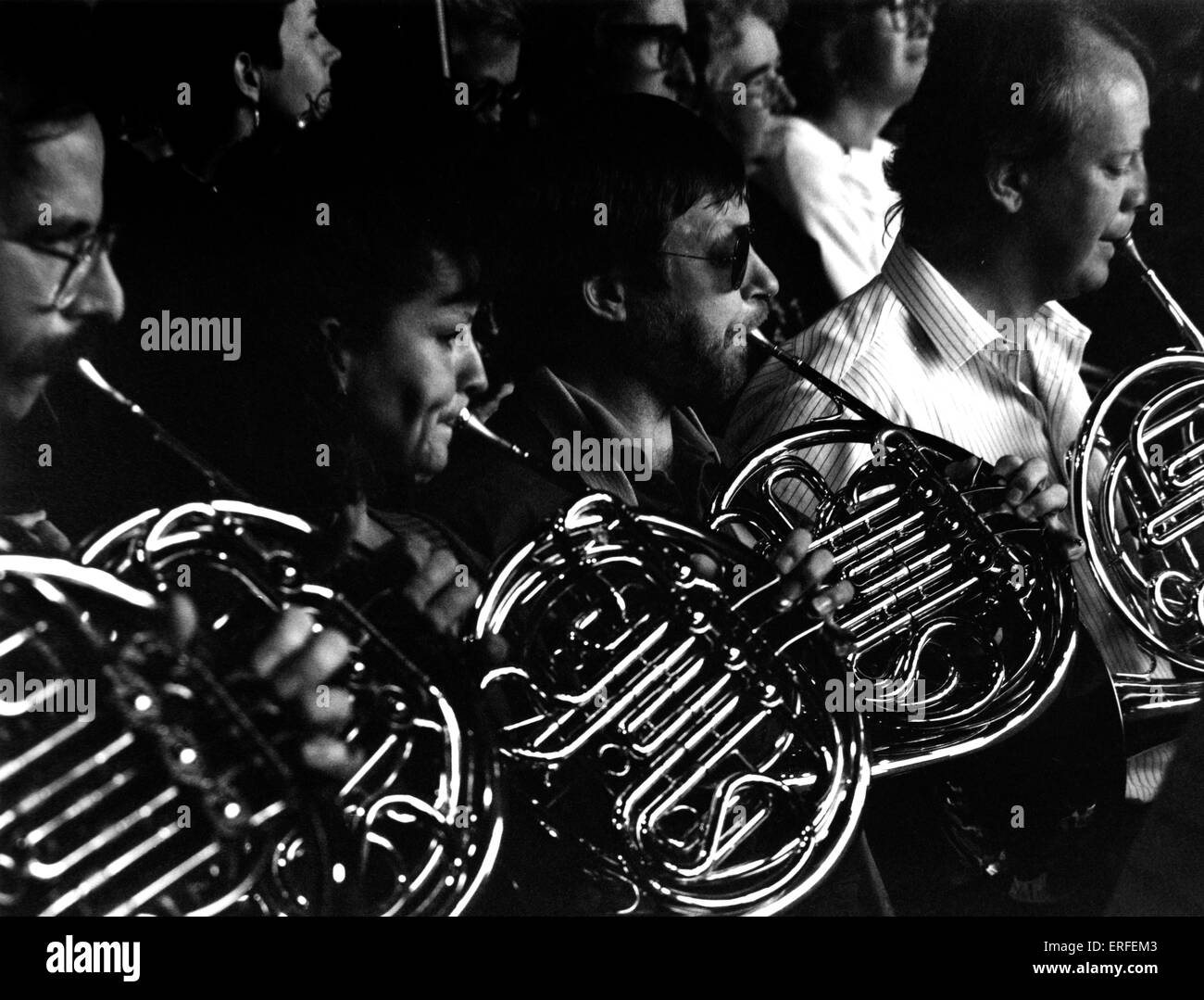 Four French Horns in orchestral arrangement. Close up of instruments. Stock Photo