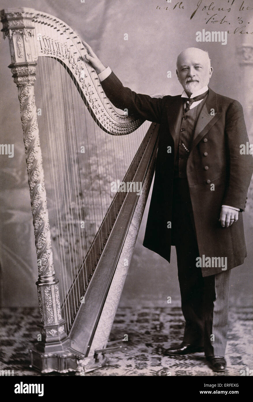 John Cheshire with harp Stock Photo Alamy
