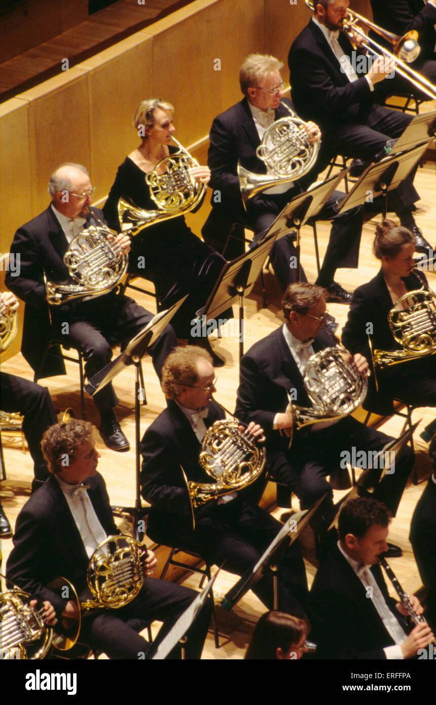 French horn orchestral section - London Philharmonic Orchestra Royal Festival Hall, London - 1999 Stock Photo