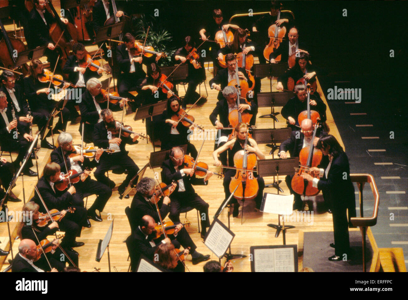 Viola and cello orchestral section - with conductor - London Philharmonic Orchestra Royal Festival Hall, London - 1999 Stock Photo