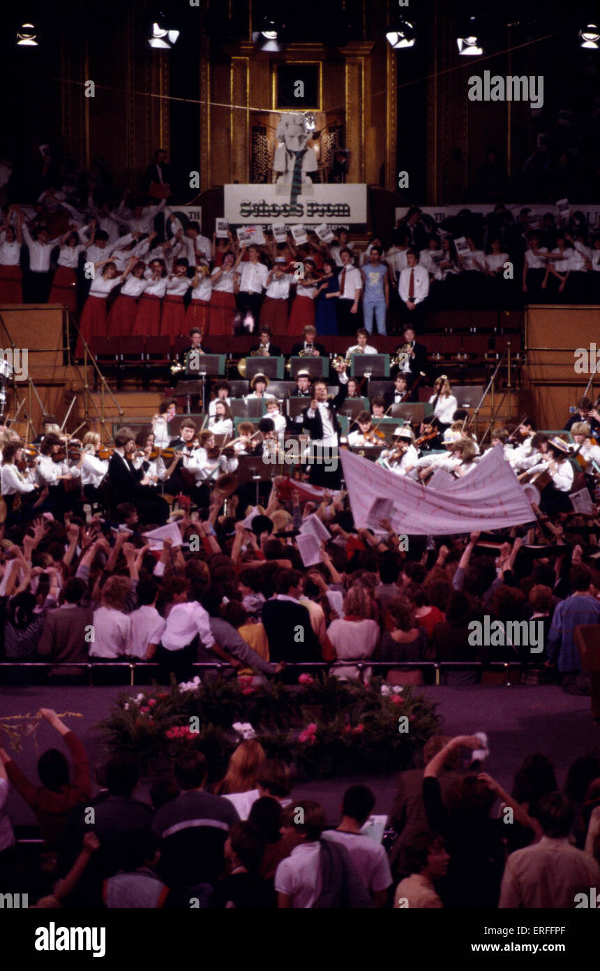 School prom - orchestra with crowd enthusiastic finale -  with conductor Antony Hopkins Stock Photo