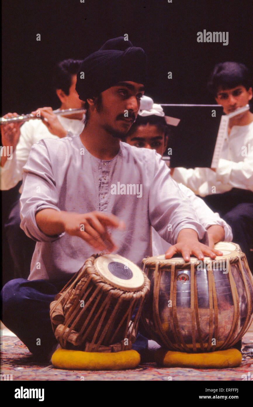Tabla player wearing white Stock Photo Alamy