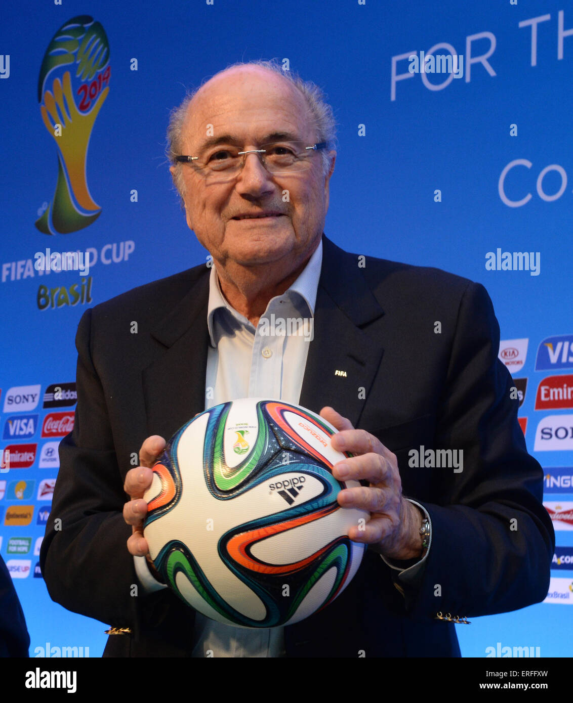 FIFA president Joseph Blatter holds the official match ball "Bazuca" at team seminar for the final draw in Costa do Sauipe, Brazil, 05 December 2013. The final draw for the preliminary round groups of the 2014 FIFA world cup Brazil will be held on 06 December 2013. Photo: Marcus Brandt/dpa Stock Photo