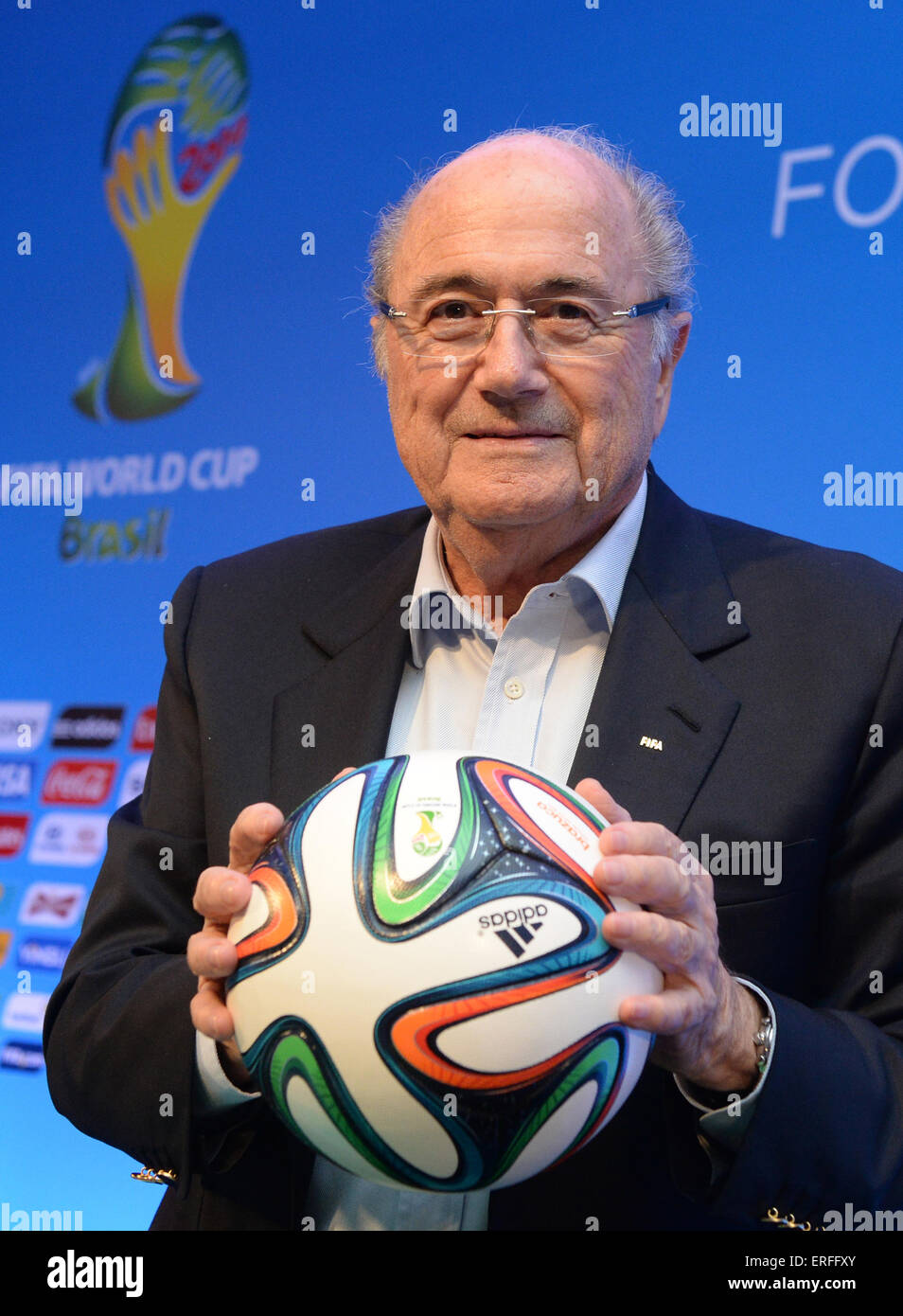 FIFA president Joseph Blatter holds the official match ball 'Bazuca' at team seminar for the final draw in Costa do Sauipe, Brazil, 05 December 2013. The final draw for the preliminary round groups of the 2014 FIFA world cup Brazil will be held on 06 December 2013. Photo: Marcus Brandt/dpa Stock Photo