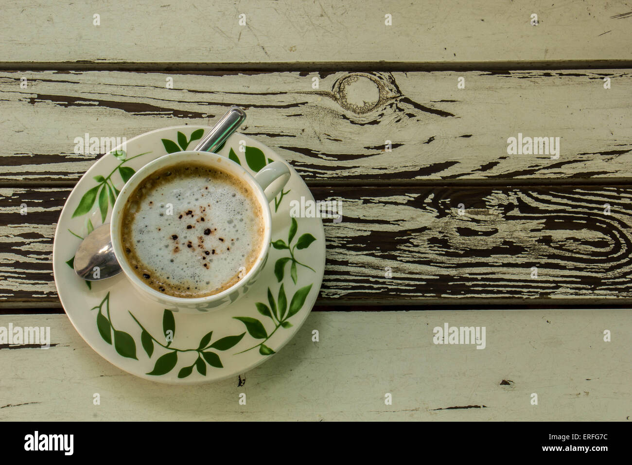 The White coffee cup on a wooden table white Stock Photo - Alamy