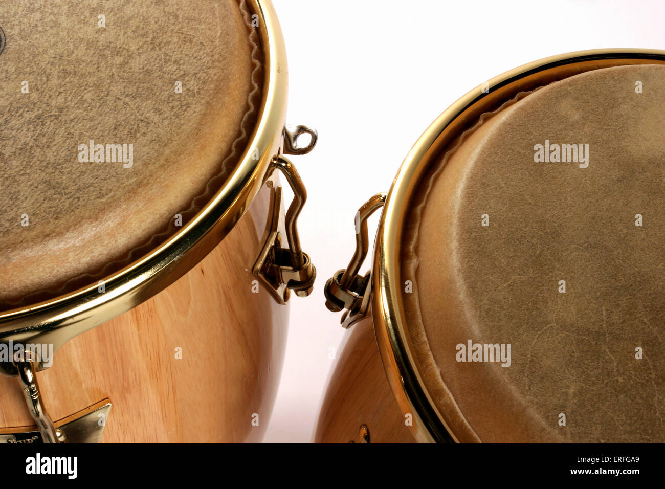 Congas pair of wood drums closeup of the heads, rims and wood