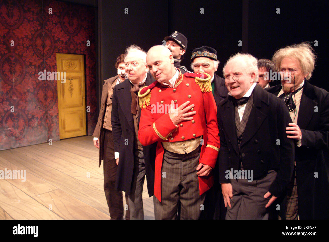 The Government Inspector - scene from the play by Nikolai Gogol with the cast of corrupt officials seen fawning to the Stock Photo