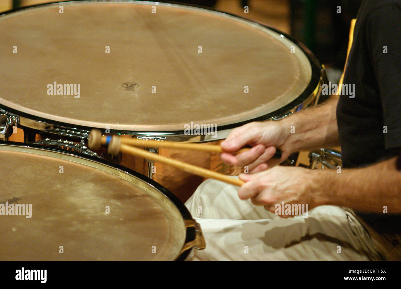 Timpani close up of the drum being played with sticks Stock Photo Alamy
