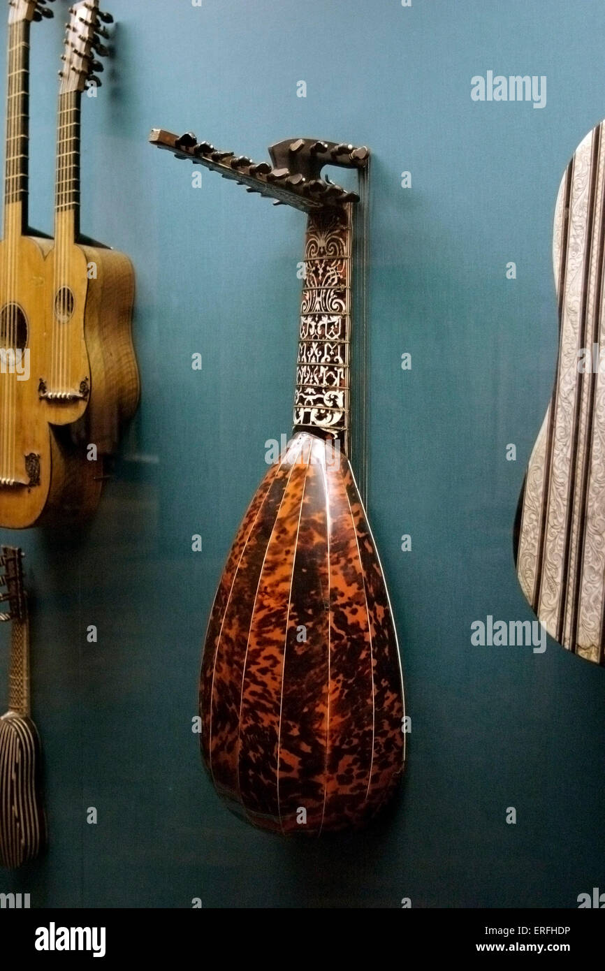Theorbo-Lute - seen from the back hanging on a wall. Stock Photo