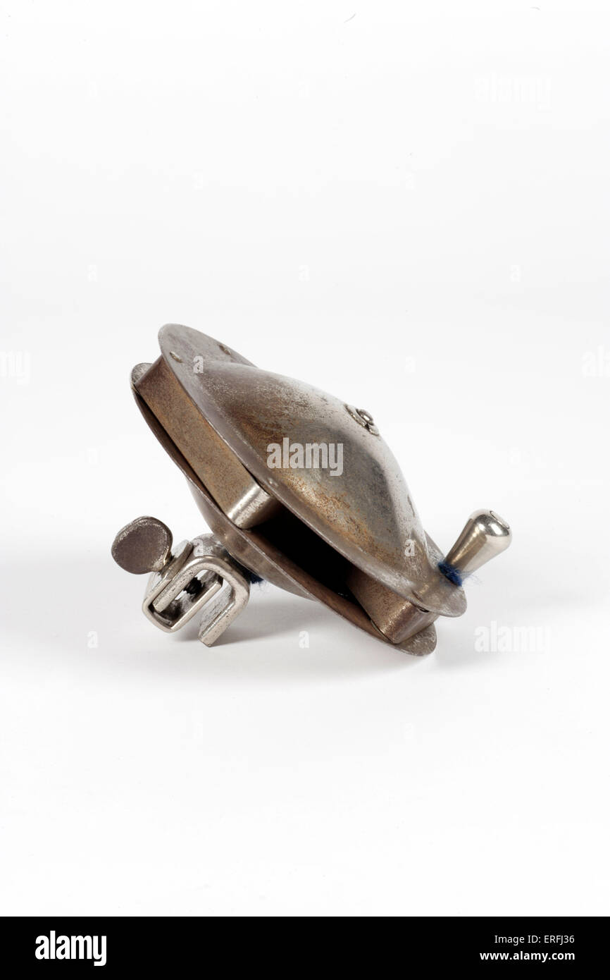 Metal ratchet percussion instrument White background Stock Photo Alamy